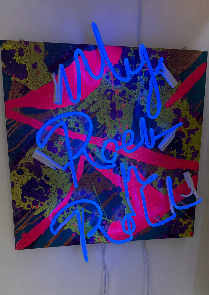 Cobalt blue rock and roll neon sign displayed in modern interior – music-inspired wall décor by Duroque