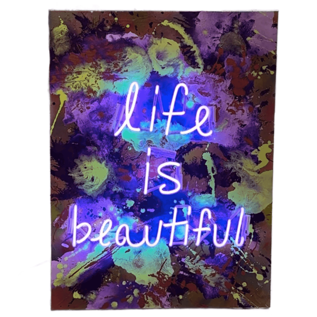 Vibrant neon wall art by Missy Sunseri, featuring the phrase 'life is beautiful' on colorful canvas.