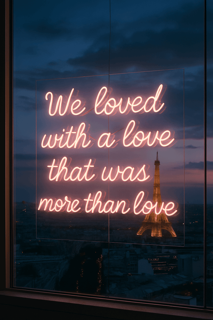 Custom glass neon sign in pink text saying 'We loved with a love that was more than love', with the Eiffel Tower in background.