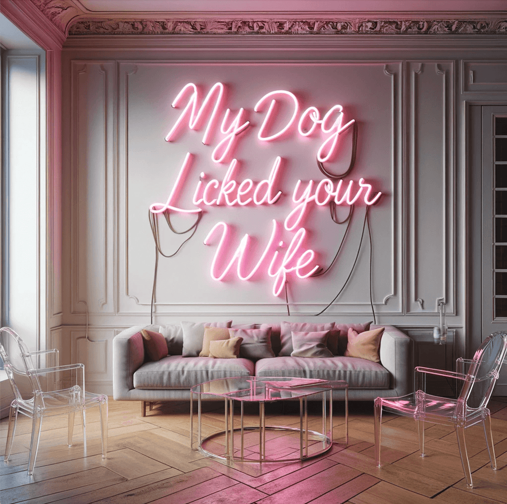 Real glass neon sign "My Dog Licked Your Wife" bright coral pink in stylish living room setting, made in Los Angeles.