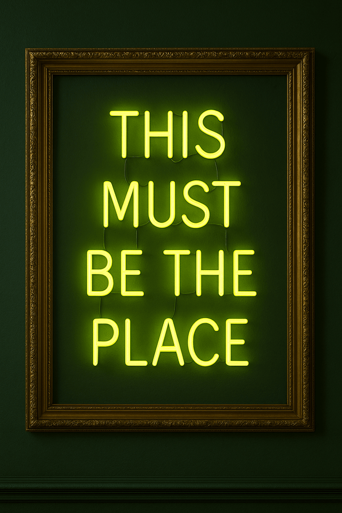 Real glass neon sign wall art saying 'This Must Be The Place', vibrant green colors in chic frame, perfect for home decor.